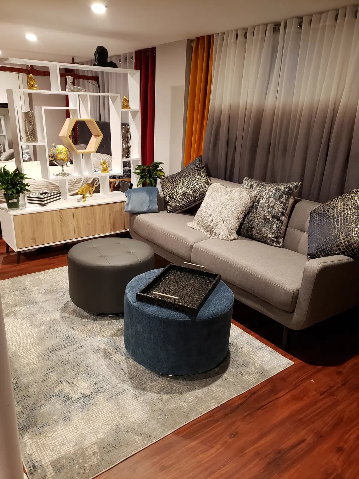 Thoughtfully designed living room with layered textures and accessible layout — by Renata Glaz